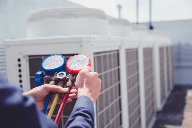 HVAC-repair-technician-inspecting-a-system-in-Lake-Zurich-Illinois-image